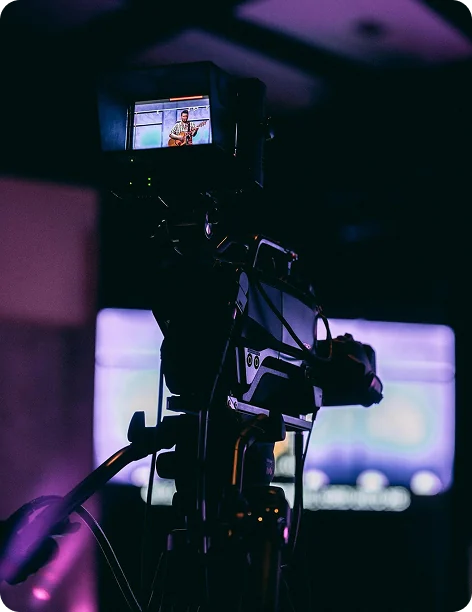 A broadcast camera at a live event.